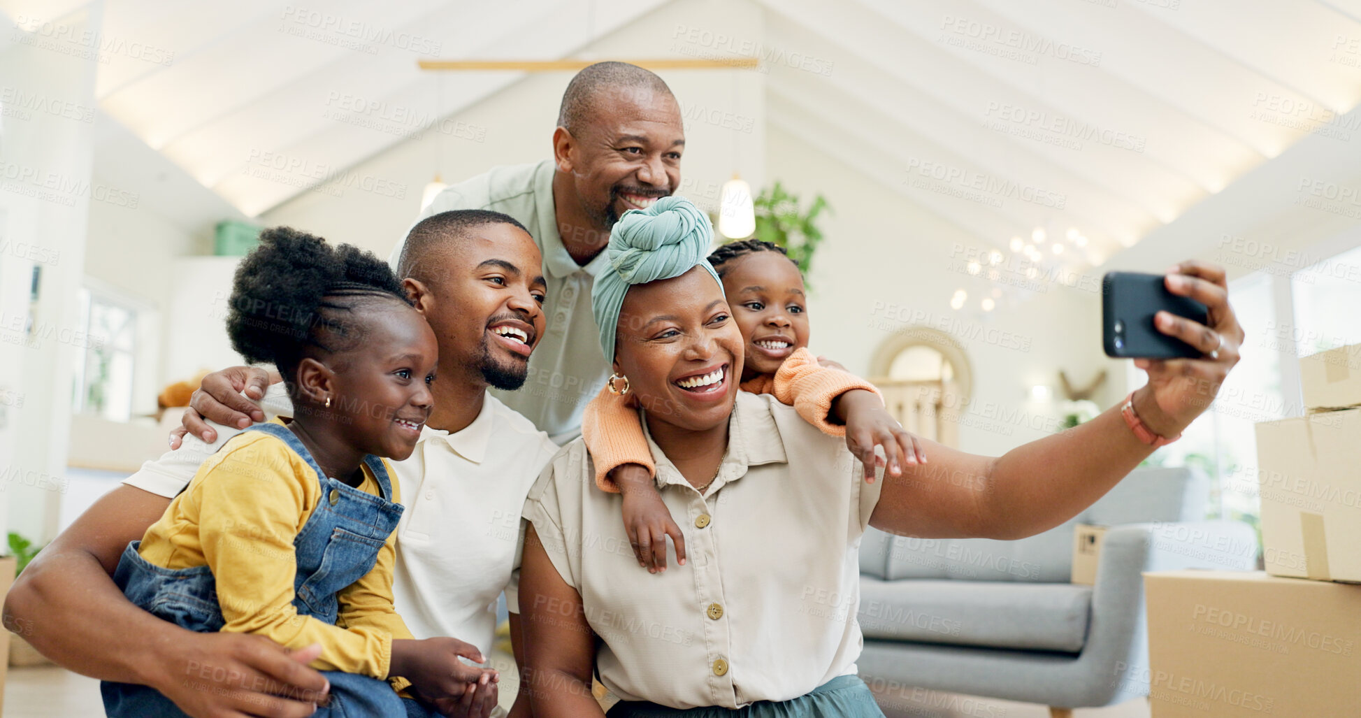 Buy stock photo Moving, happy family and selfie with kids in new home, boxes and people in living room of house. African mother, father and children in self portrait with boxes, real estate and happy investment.