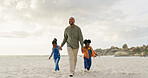 Walking, father and children holding hands at the beach for bonding, summer freedom and care. Happy, family and an African dad with affection for kids on a walk in the sand at the ocean on holiday