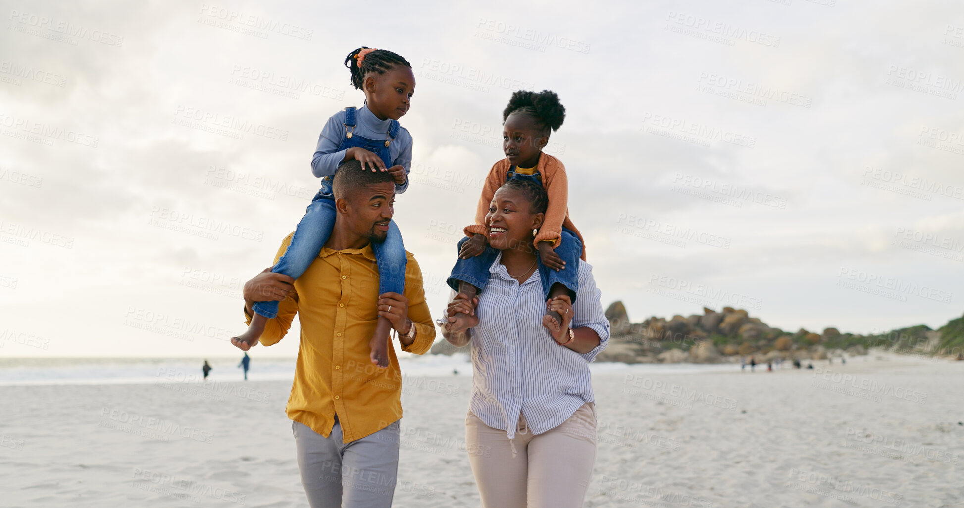 Buy stock photo Family, kids on parents shoulders at beach and travel, playful and freedom outdoor with love and bonding. Carefree, energy and holiday, people walk in nature, mom and dad with children and happiness