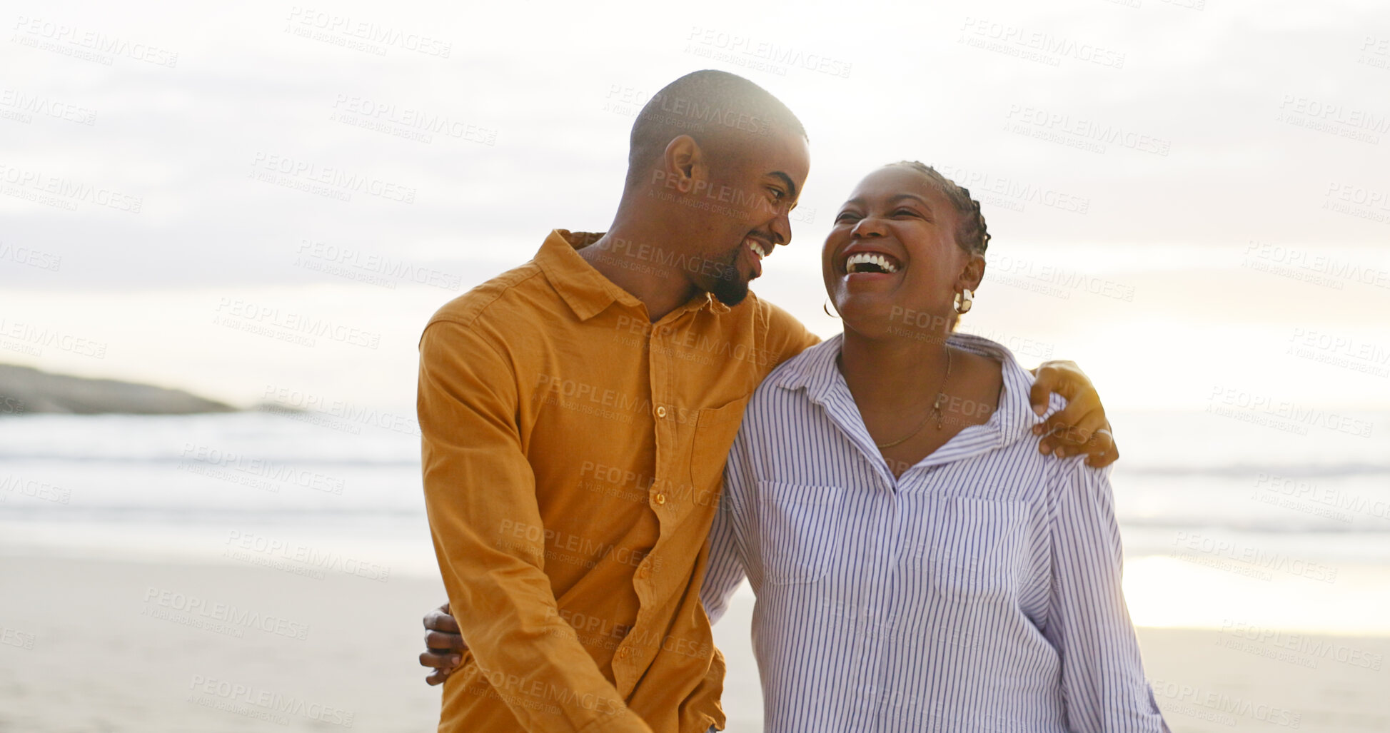 Buy stock photo African couple, beach and arm for walk with love in outdoor for quality time on vacation. Happiness, man and women with bonding with ocean for travel or holiday to relax are cheerful together.