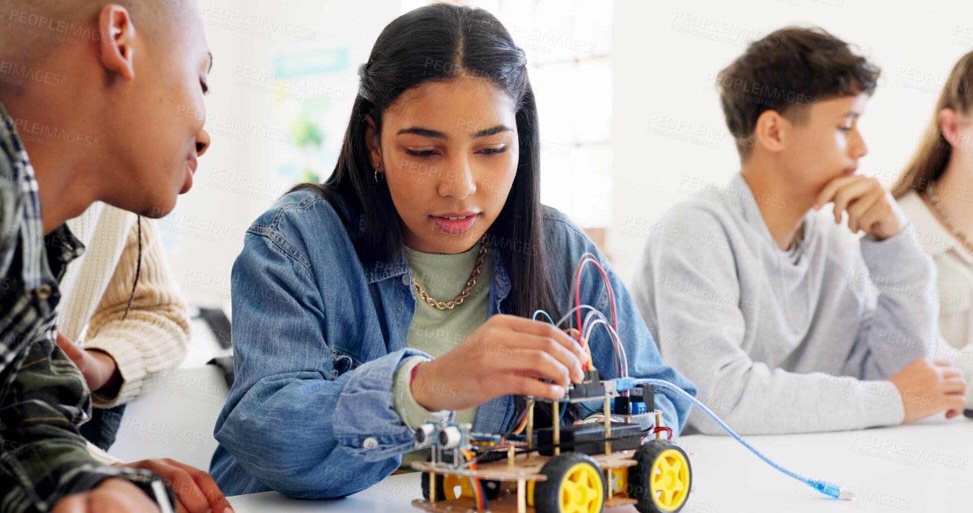 Buy stock photo Technology, car robotics and students in classroom, education or learning electronics with car toys for innovation. School kids, learners and transportation knowledge in science class for research