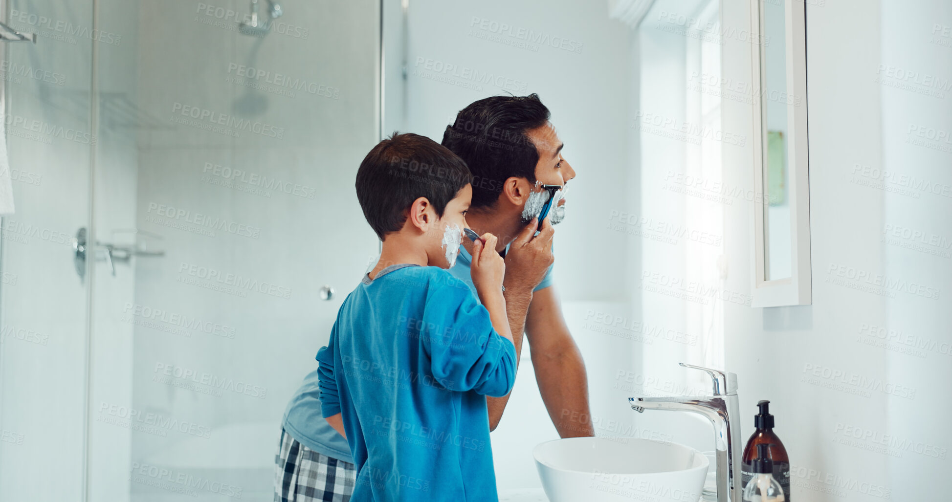 Buy stock photo Dad, boy and learning to shave in bathroom with facial cream, skincare routine and support. Father, kid and teaching about cosmetics of cleaning face, beard and foam for love, care and family at home