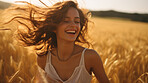 Happy young woman smiling in field of flowers. Sunset, golden hour.