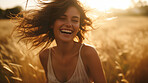 Happy woman. Dancing in field. Laughing and enjoying sunset.
