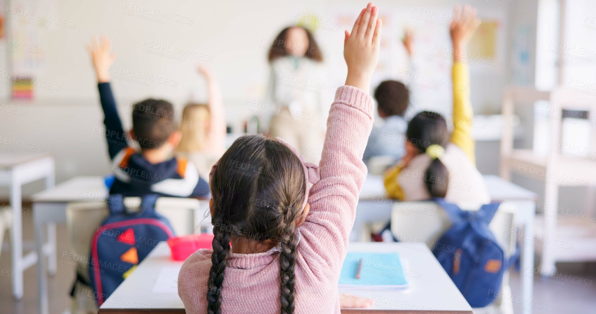 Buy stock photo Education, raised hand and girl student in classroom with teacher for learning, discussion and knowledge. Help, studying and children students with questions for female educator or tutor at school.