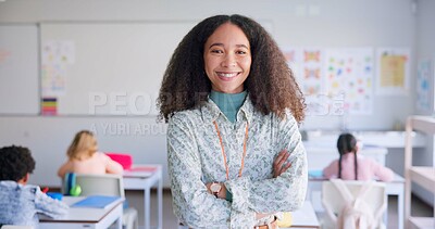 Female teacher, arms crossed and smile in class with school kids, pride or happy for education career. Woman, classroom and learning expert for children, face or portrait with development for future