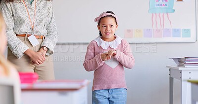 Class, presentation and happy child speaker with applause and cheering in classroom at school. Young kid, education and talk of project with a student and teacher with children group discussion