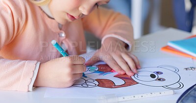 Girl child, drawing and color in classroom, learning and development with art, animal sketch or paper at desk. Female kid, writing and notebook for bear, education or pen for study, academy or school