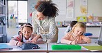 Help, teacher and woman in a classroom, students and education with studying, conversation and knowledge. Person, educator and children writing, learning and kids with answers, explain and lessons