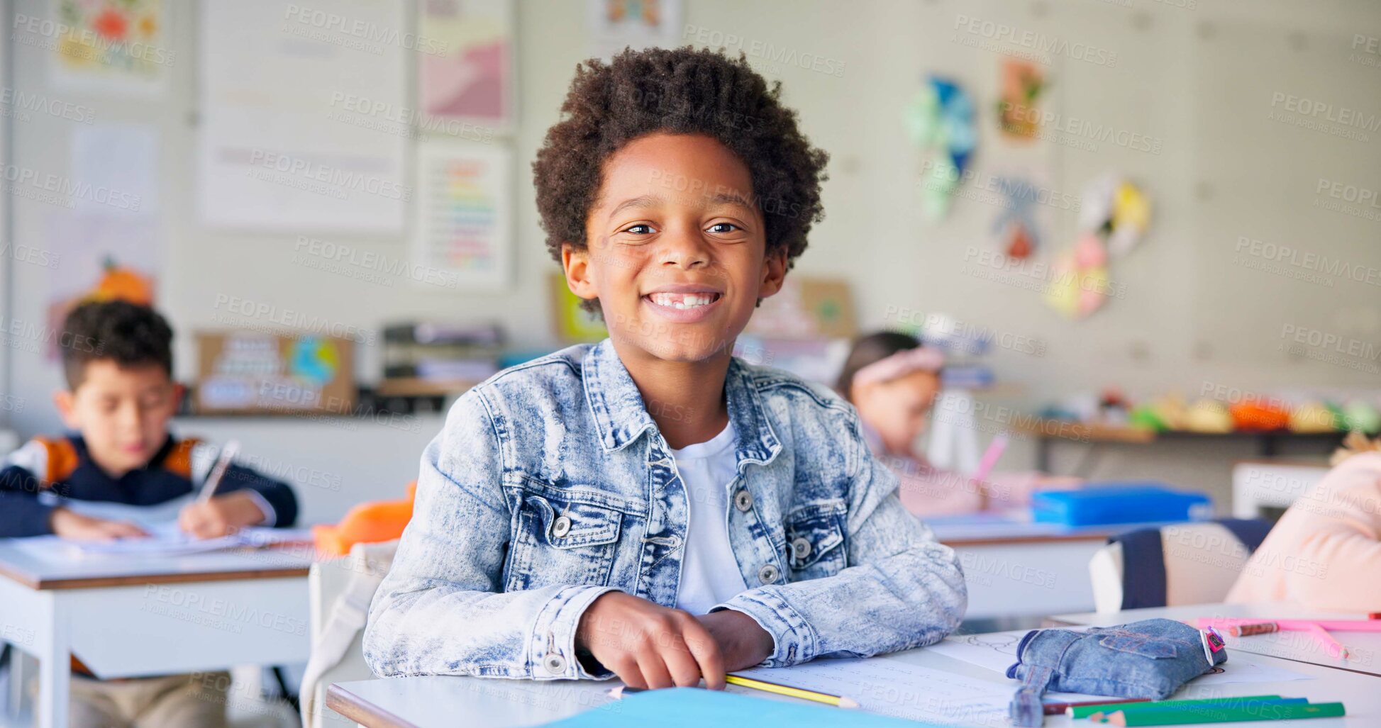 Buy stock photo Smile, education and writing with boy in classroom for learning, knowledge and study. Scholarship, happy and future with portrait of young student at school for academy, exam test and project