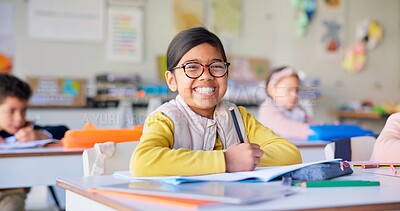Buy stock photo Smile, learning and study with girl in classroom for education, knowledge and writing. Scholarship, happy and future with portrait of young student at school for academy, exam test and project