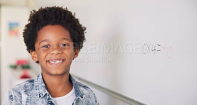 Buy stock photo Math class, portrait of child at board for education, learning and problem solving for skill development. Boy at whiteboard in classroom with smile, happiness and solution at school for knowledge.