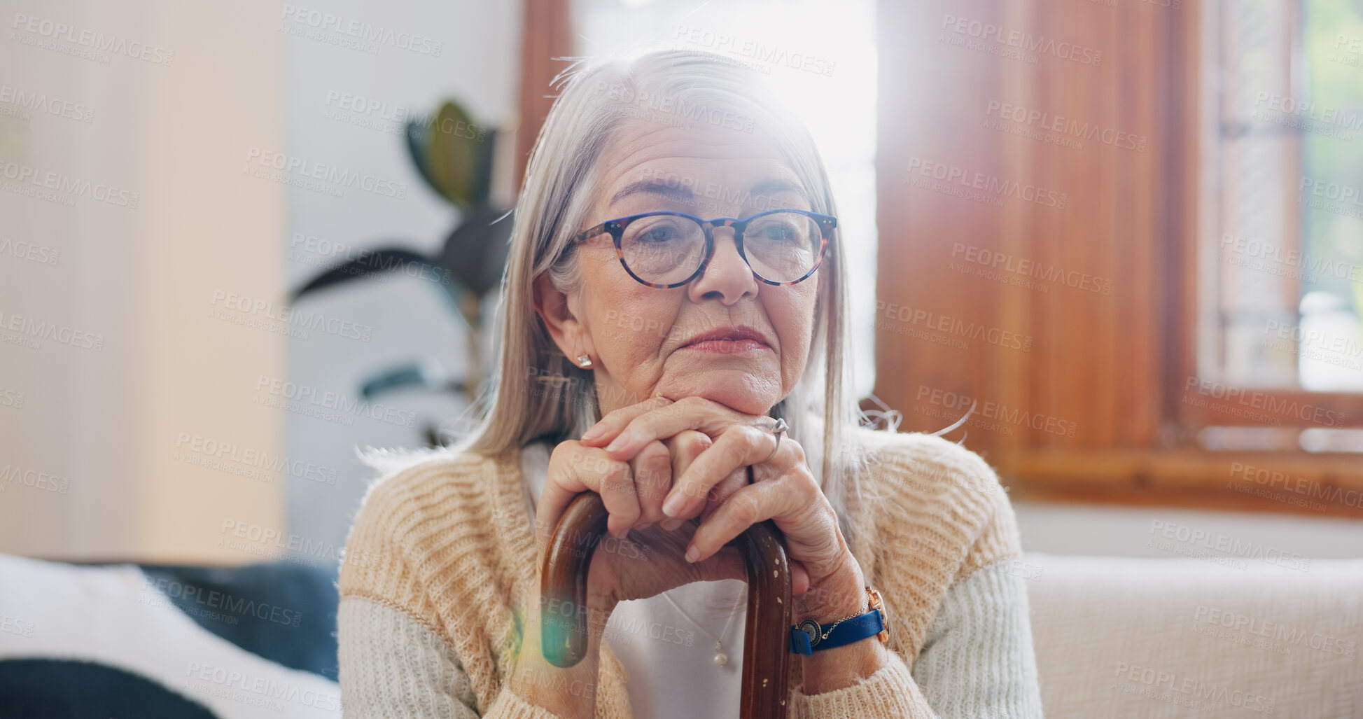 Buy stock photo Home, thinking and senior woman with depression, sad and retirement with memory, remember and anxiety. Mature person, elderly lady and pensioner with walking stick, alzheimer and mental health