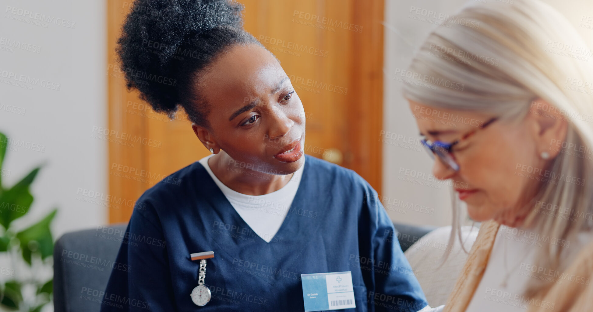 Buy stock photo Frustrated, sad woman speaking or nurse with results in consultation for bad news or cancer. Stress, lady talking or caregiver with a depressed mature patient for empathy, sympathy or help in home