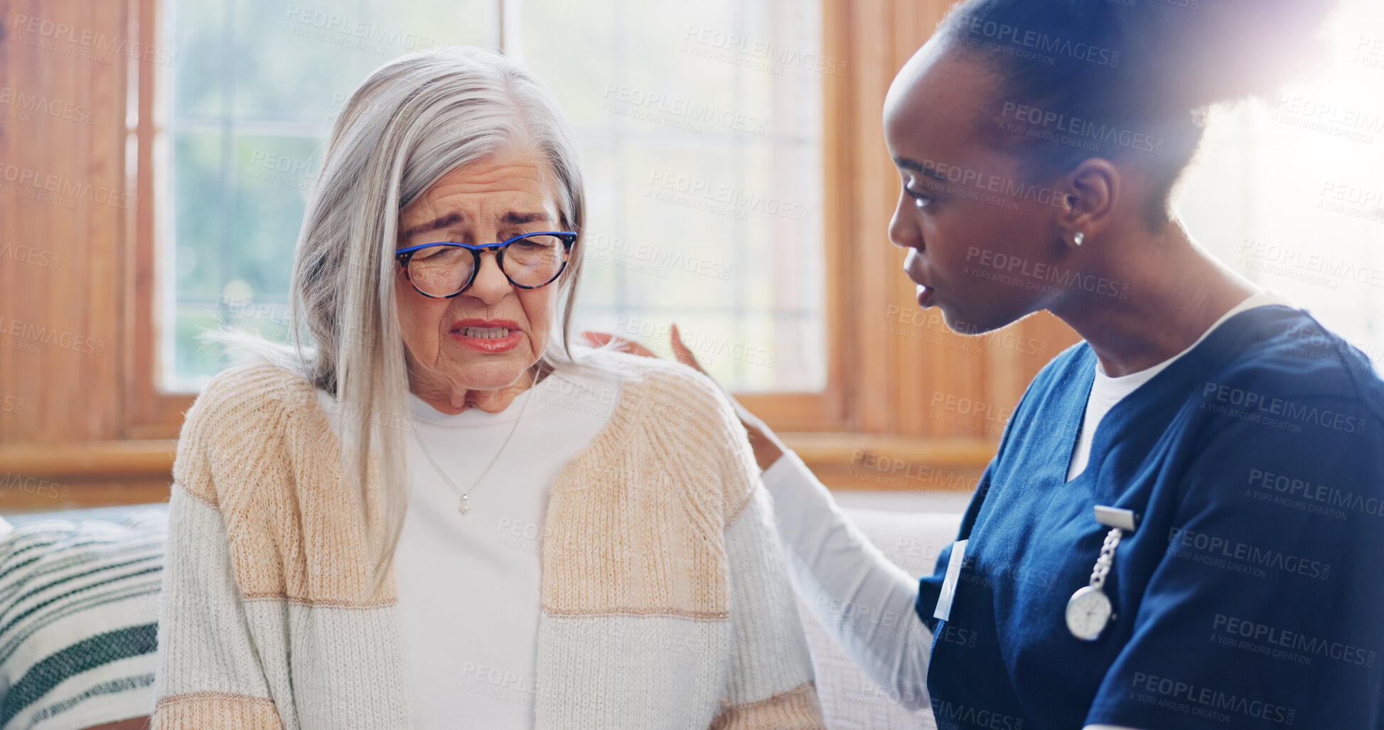 Buy stock photo Mature, sad woman or nurse with support or results in consultation for bad news or cancer disease. Stress, depression or caregiver with a crying senior patient for empathy, sympathy or help in home