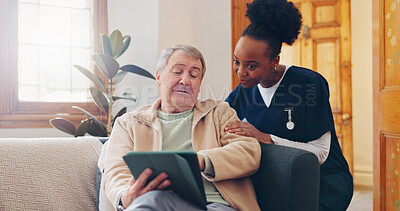 Healthcare, tablet and an elderly man with a caregiver during a home visit for medical checkup in retirement. Technology, medicine and appointment with a nurse talking to a senior patient on the sofa