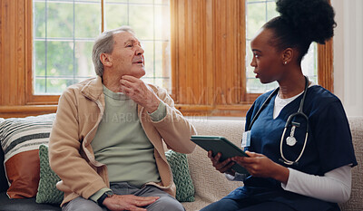 Healthcare, tablet and a senior man with a caregiver during a home visit for medical checkup in retirement. Technology, medicine and appointment with a nurse talking to an elderly patient on the sofa
