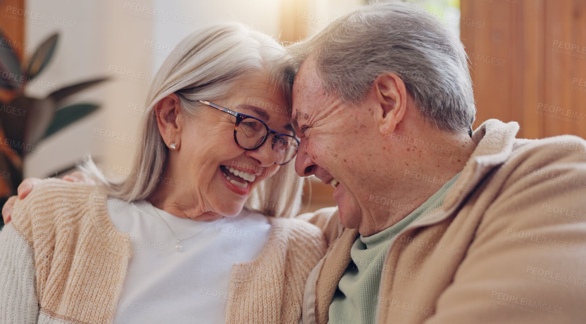 Buy stock photo Care, happy and a senior couple talking on the sofa for marriage kindness and gratitude. Smile, house and an elderly man and woman with love, relax and communication in retirement on the couch