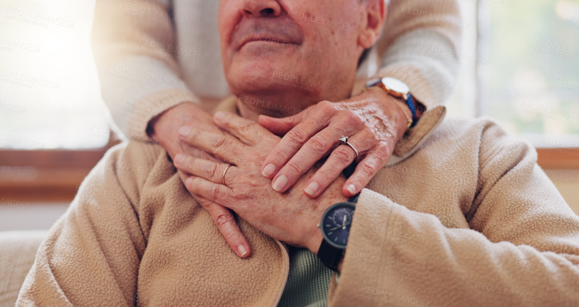 Buy stock photo Hands, empathy and a senior couple closeup in their home for love, support or trust during retirement. Hope, healing and sympathy with elderly people on a sofa in the living room of their home