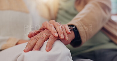 Hands, support and a senior couple closeup in their home for love, sympathy or trust during retirement. Hope, healing and empathy with elderly people on a sofa in the living room of their home