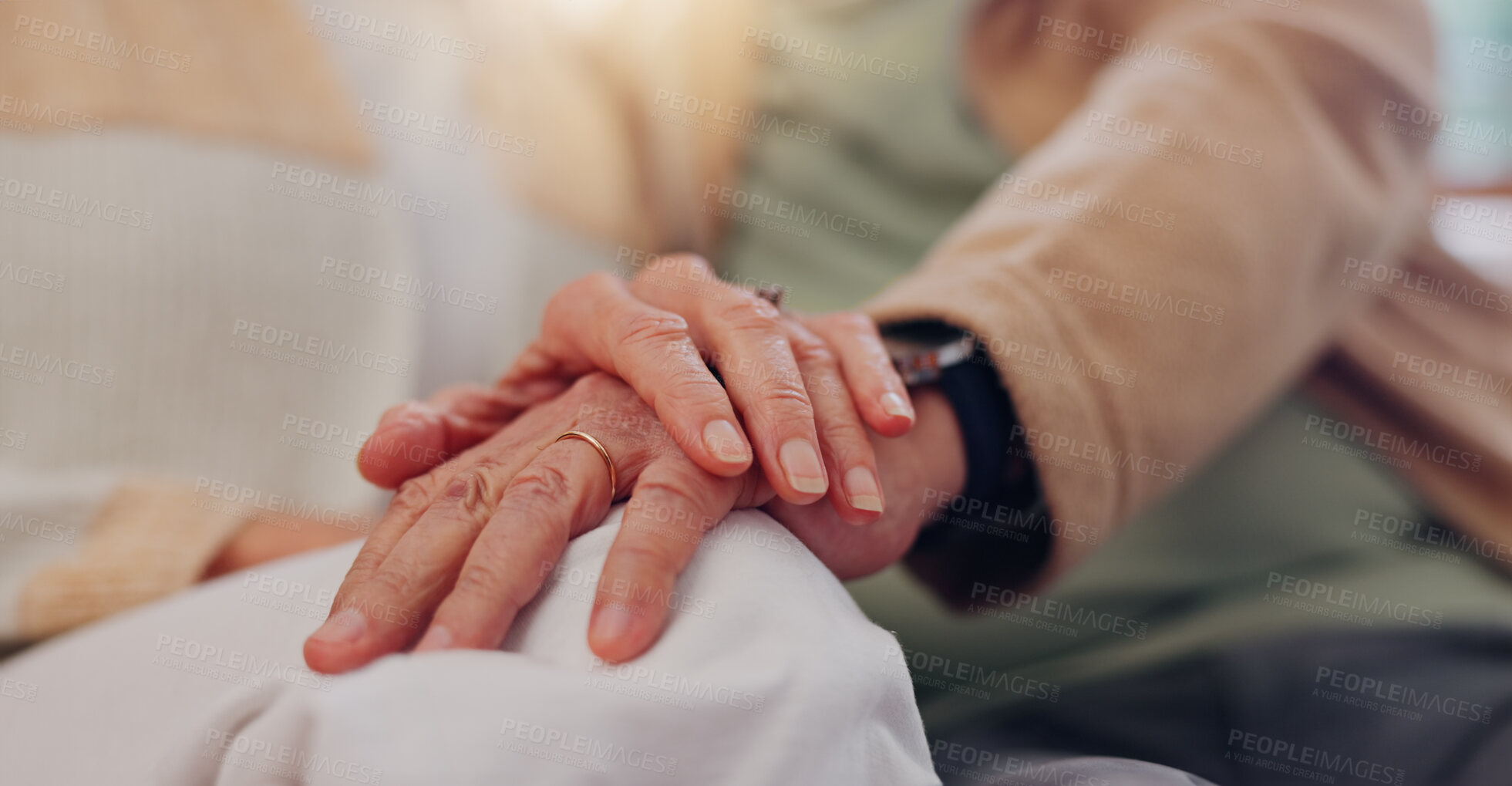 Buy stock photo Hands, support and a senior couple closeup in their home for love, sympathy or trust during retirement. Hope, healing and empathy with elderly people on a sofa in the living room of their home