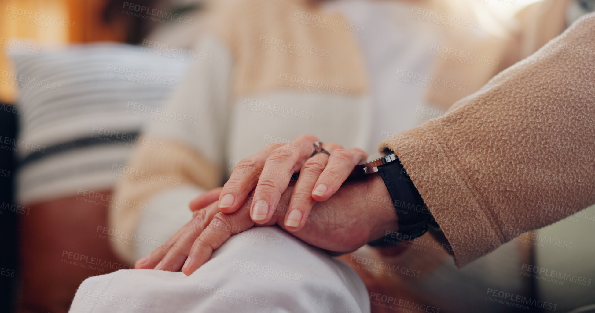 Buy stock photo Hands, support and a senior couple closeup in their home for love, sympathy or trust during retirement. Hope, healing and empathy with elderly people on a sofa in the living room of their home