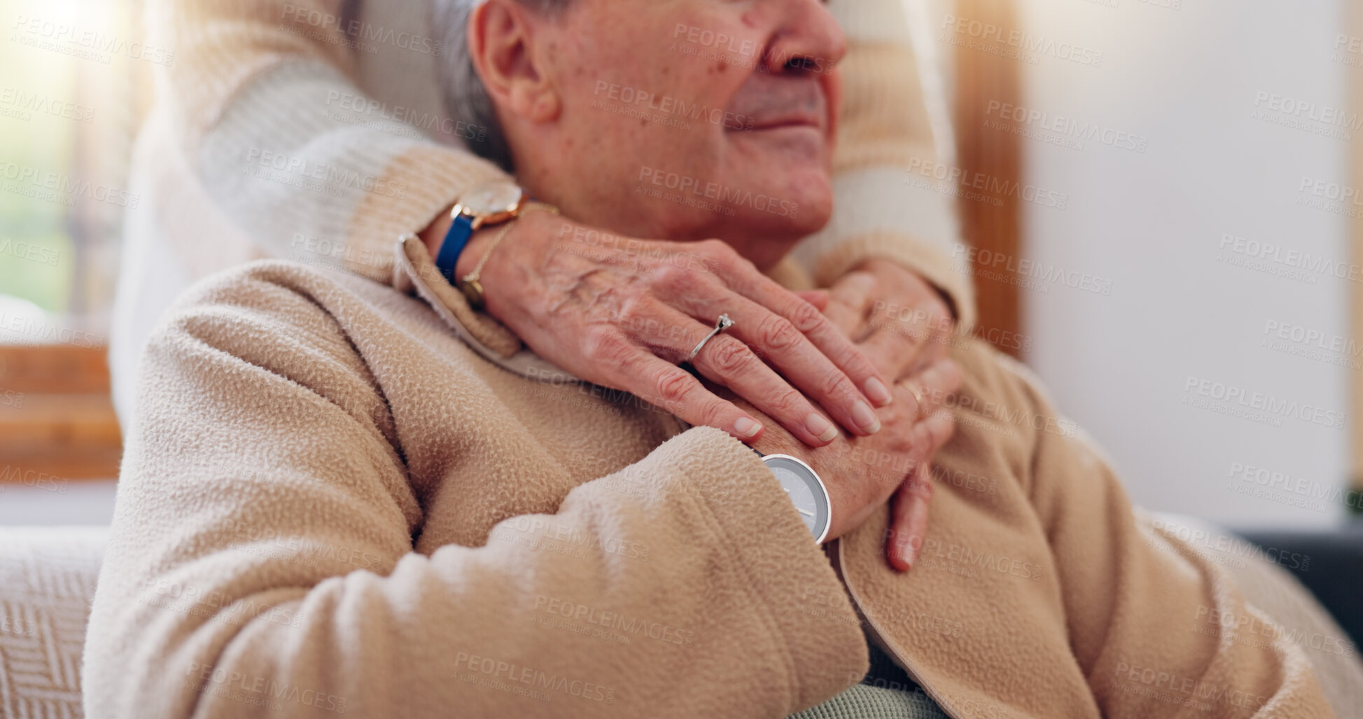 Buy stock photo Hands, empathy and a senior couple closeup in their home for love, support or trust during retirement. Hope, healing and sympathy with elderly people on a sofa in the living room of their home