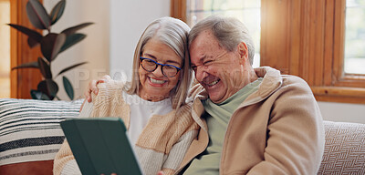 Tablet, laugh and senior couple on a sofa watching a funny, comic or comedy video on social media. Happy, smile and elderly people in retirement scroll on mobile app or internet on digital technology