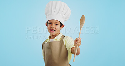 Buy stock photo Happy, face and child with a spoon for baking, young chef or getting ready for the kitchen. Smile, boy kid or portrait with equipment for cooking, future career or preparation on a studio background