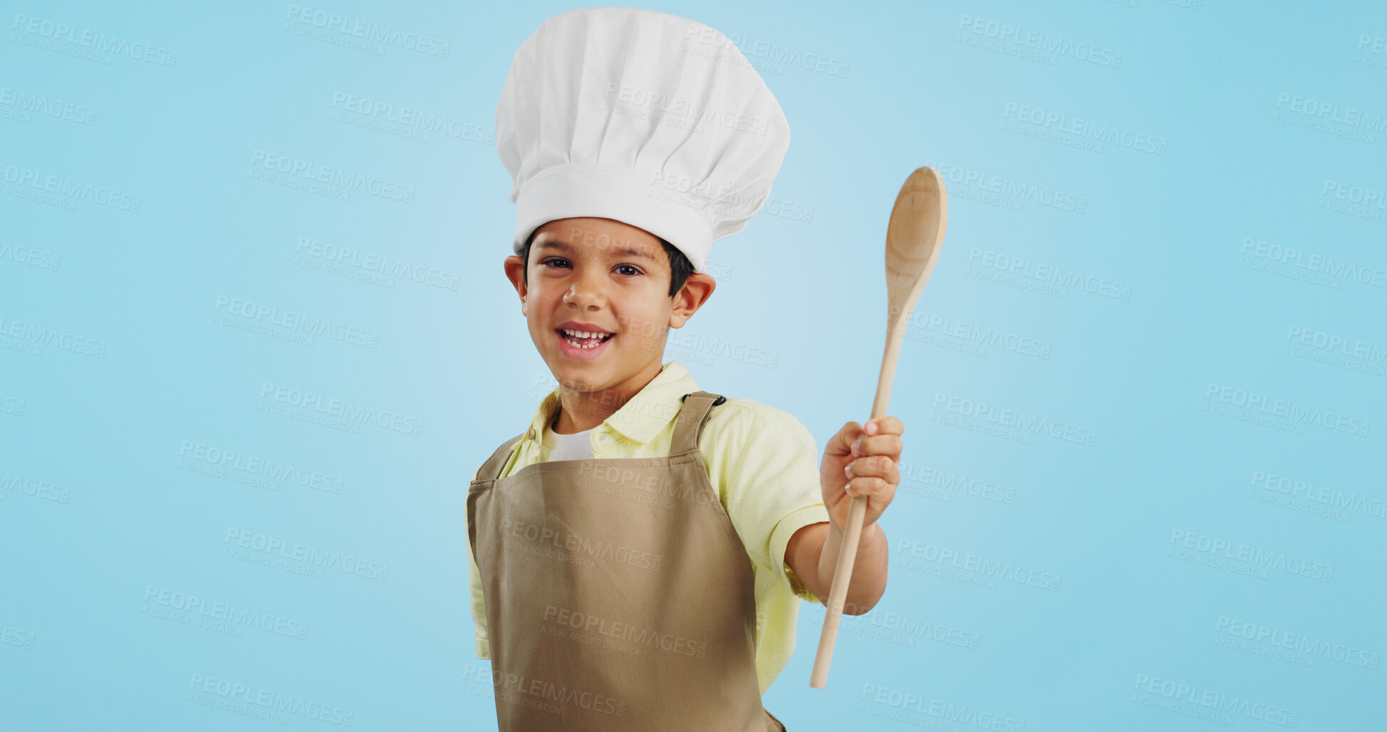 Buy stock photo Happy, face and child with a spoon for baking, young chef or getting ready for the kitchen. Smile, boy kid or portrait with equipment for cooking, future career or preparation on a studio background