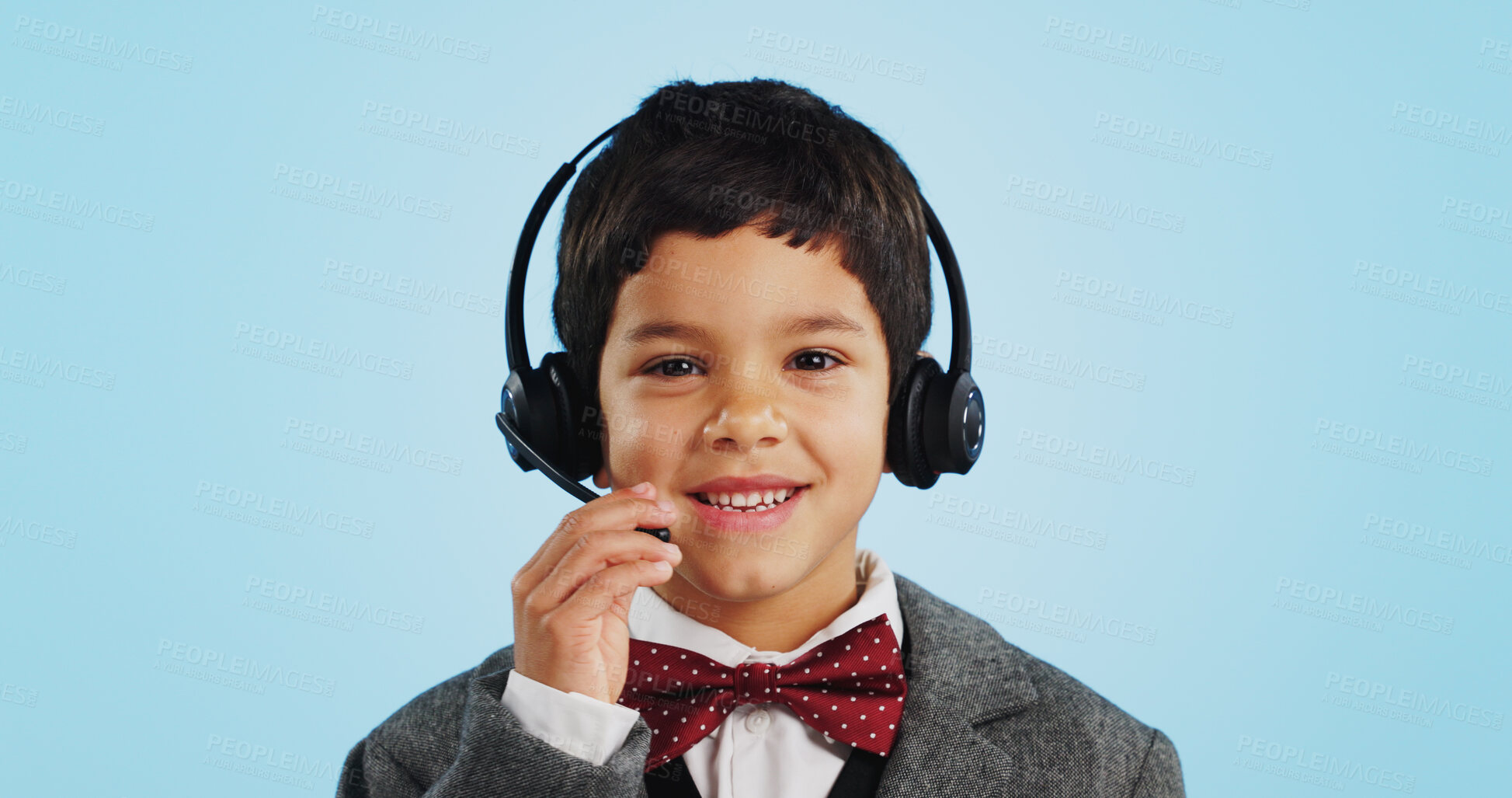 Buy stock photo Face, studio or child consultant in call center talking or networking for telecom on blue background. Young, contact or friendly kid sales agent in communication or conversation at customer service