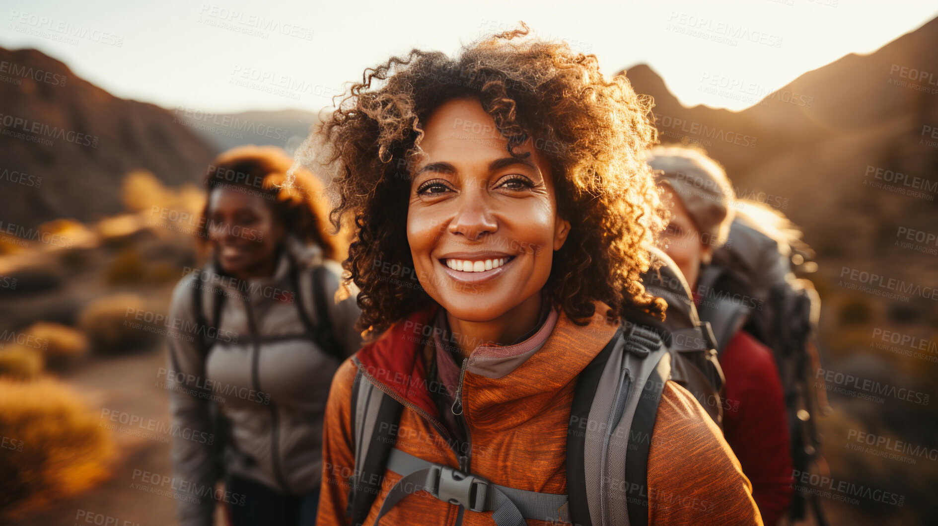 Buy stock photo Woman Smiling at camera during sunset hike. Group hike. Lifestyle concept.