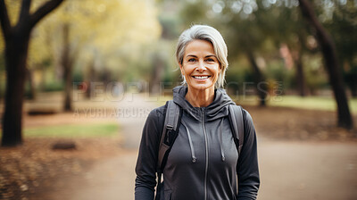 Buy stock photo Fit mature female walking in park. Confident smile. Looking at camera.