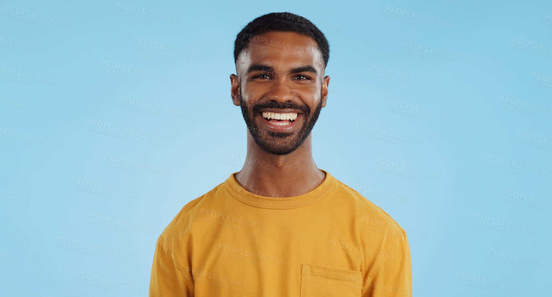 Buy stock photo Happiness, man and laughter with comedy in studio, casual fashion and portrait by blue background. Mexican person, face and positive attitude with reaction to silly joke, mockup and announcement