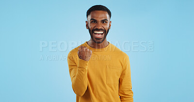 Buy stock photo Wow, news and happy man in studio with winner, fist or celebration, dance or victory on blue background. Surprise, success or portrait of guy winner with energetic reaction to prize, giveaway or deal