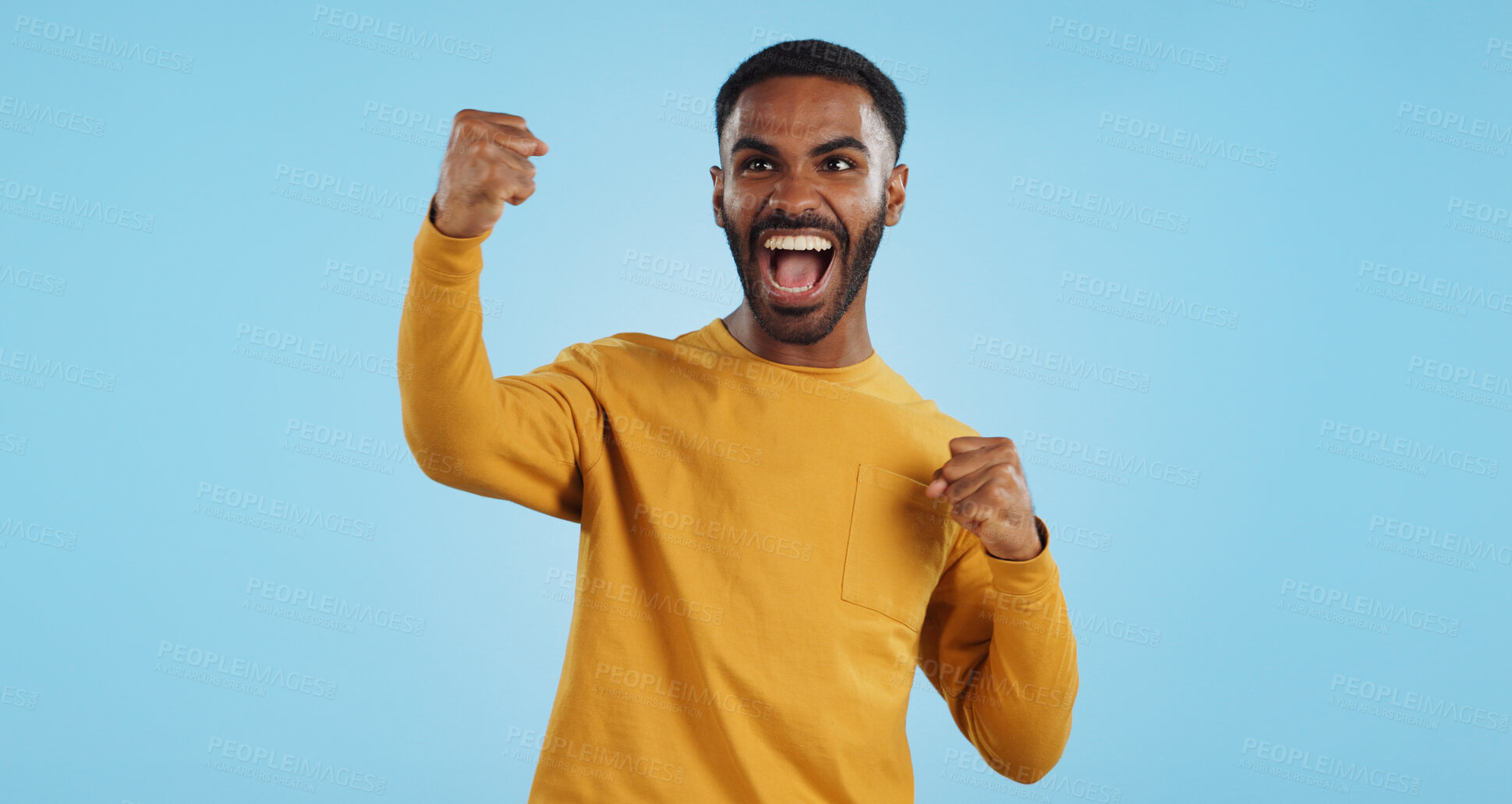 Buy stock photo Wow, news and happy man in studio with winner, fist or celebration, dance or victory on blue background. Surprise, success or portrait of guy winner with energetic reaction to prize, giveaway or deal