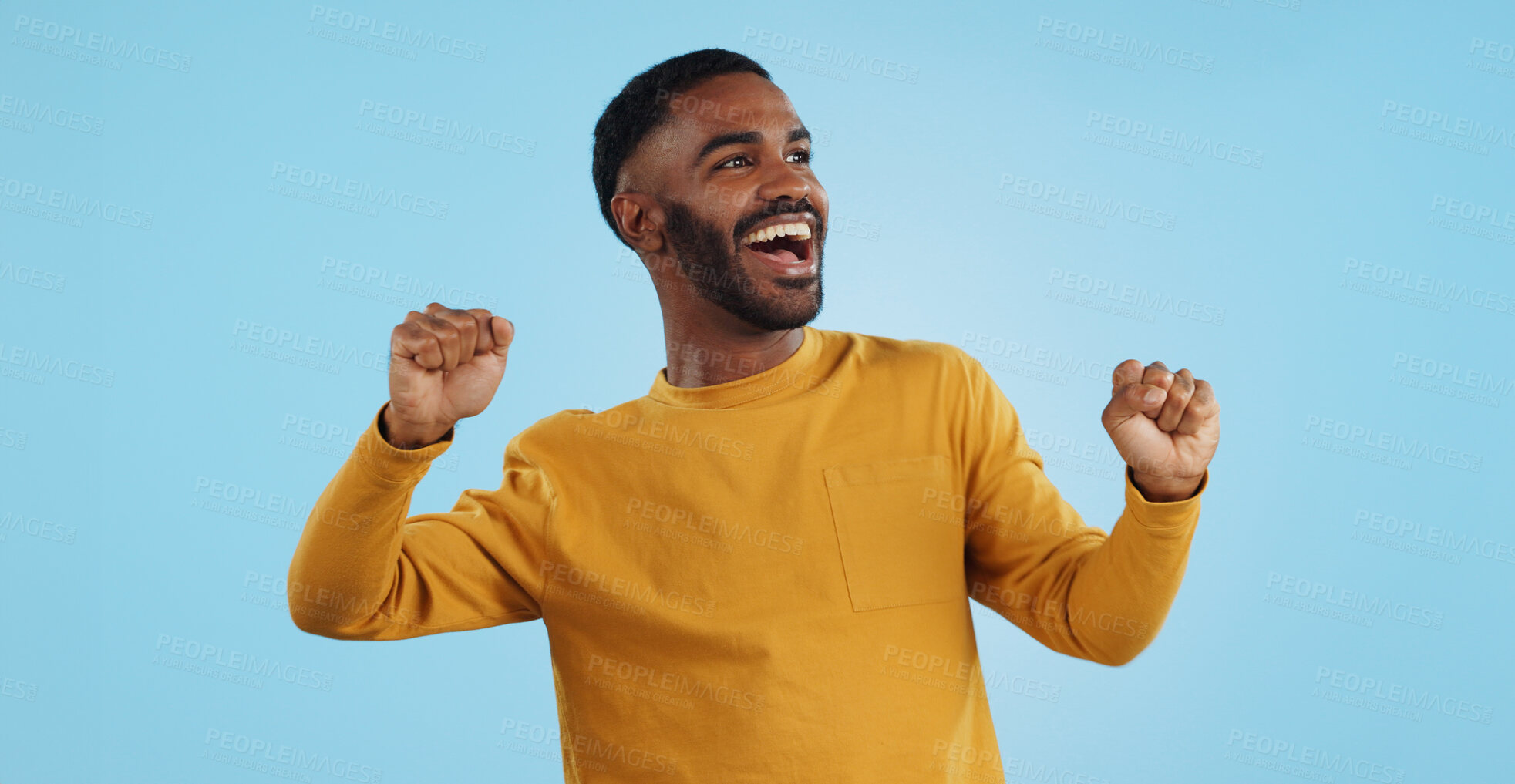 Buy stock photo Dance, man and excited for party in studio to celebrate success, promotion and winning lotto on blue background. Happy young model, giveaway winner and energy for disco, groovy music and freedom