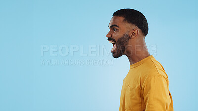 Stress, angry and man shouting in studio with anxiety, frustrated or disaster on blue background. Mistake, fail and profile of guy model with screaming reaction to mental health crisis, fear or panic
