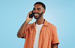 Phone call, funny and black man talking, conversation and joke in studio isolated on a blue background mockup space. Smartphone, laughing and happy African person in communication, meme and comedy
