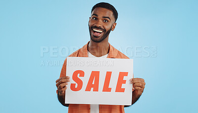 Buy stock photo Studio sales poster, happy man and surprise ads commercial, discount promotion banner or notification sign. Billboard info, placard and ambassador presentation, choice or deal on blue background