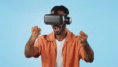 Buy stock photo Gamer man, virtual reality and glasses in studio with hand, click and swipe in metaverse by blue background. Person, AR vision and futuristic 3D user experience with grab, cyber ui and digital world