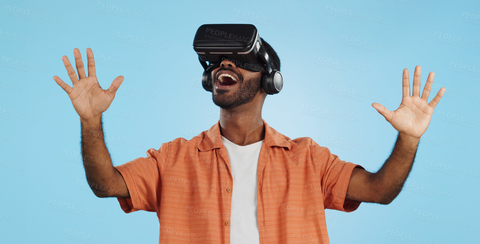 Buy stock photo Man, virtual reality and glasses in studio with wow, hand and happy surprise in metaverse by blue background. Person, AR vision and futuristic 3D user experience with shock, cyber ui or digital world