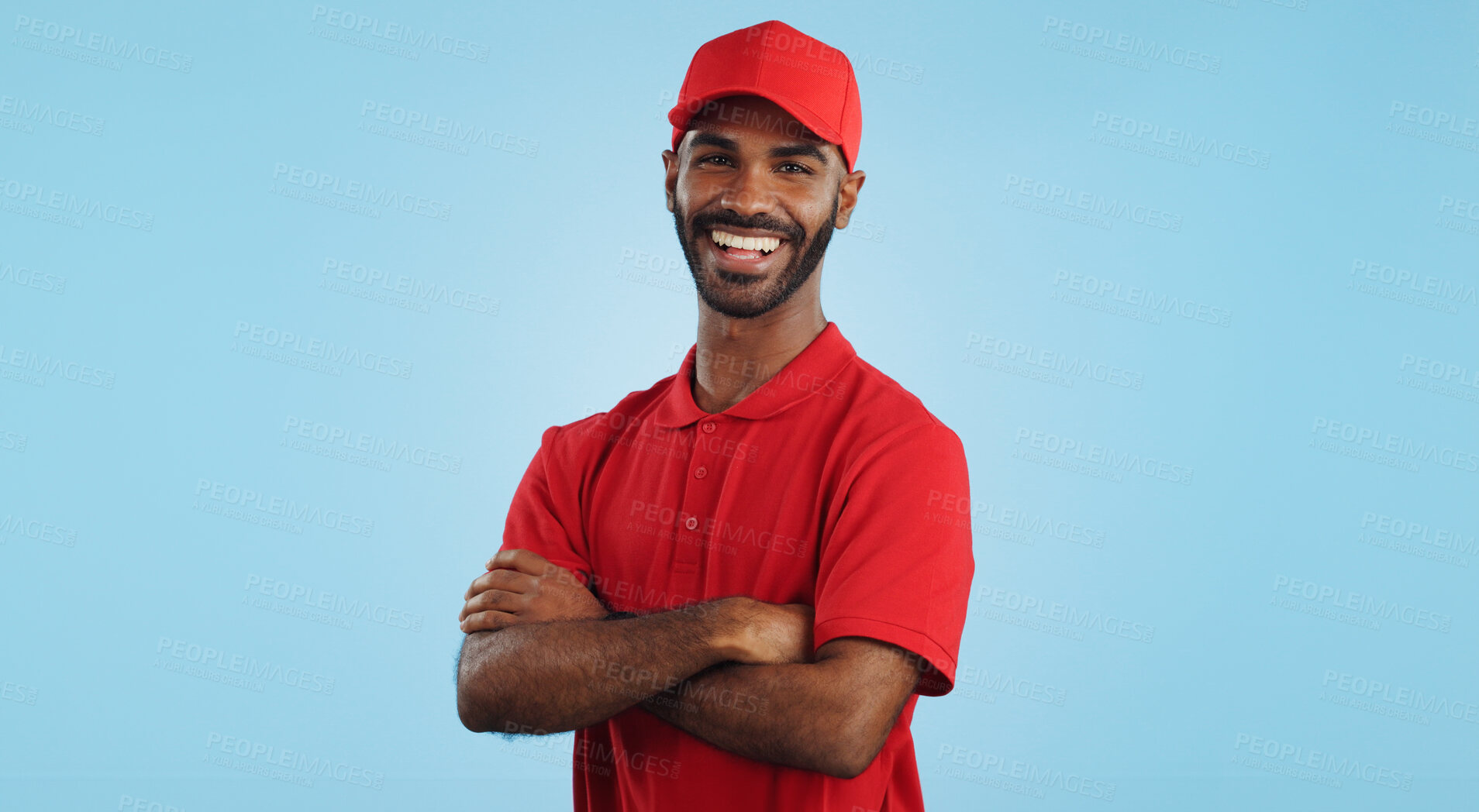 Buy stock photo Delivery man, arms crossed in portrait and e commerce, distribution with supplier and service on blue background. Professional, supply chain and logistics worker for shipping and courier in studio