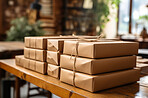 Parcels or gifts piled on table.  Delivery concept.