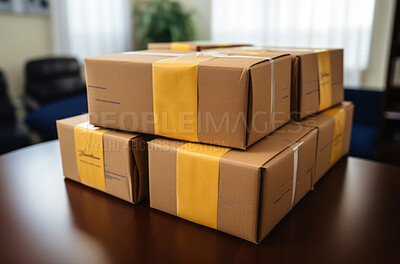 Packages seen on table in front of window in home. Delivery concept.
