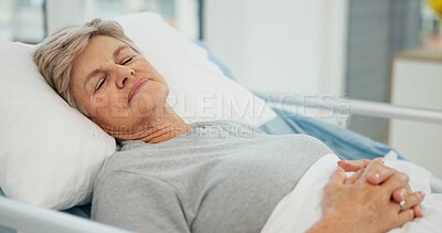 Hospital, sleep and senior woman in bed for recovery, resting and relaxing after surgery treatment. Healthcare, clinic and elderly female person with eyes closed for medical care, service and help