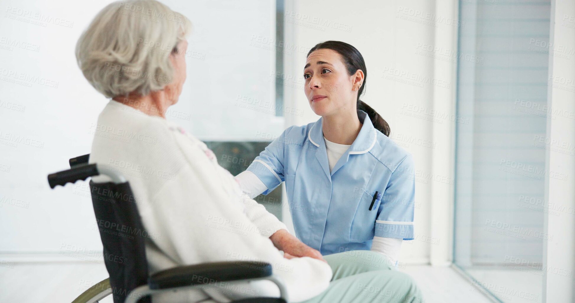 Buy stock photo Medical, wheelchair and a woman nurse talking to a senior patient with a disability in a clinic. Healthcare, retirement and support with a female medicine professional talking to a resident at home