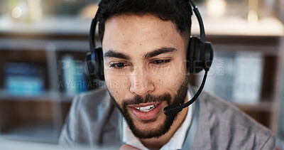 Businessman, face and consulting in call center, support or customer service at office. Closeup of man, consultant or agent talking on headphones for online advice, help or communication at workplace