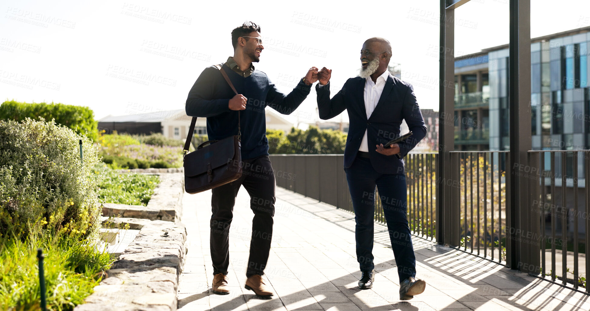 Buy stock photo Business people, outdoor and men with fist bump, partnership and agreement with b2b deal. Staff, support and employees outside, hand gesture and thank you with cooperation, teamwork and collaboration