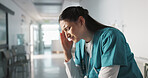 Stress, sad and loss with a woman nurse in hospital after a fail, mistake or error in healthcare treatment. Depression, anxiety and grief with a young medicine professional in a medical clinic